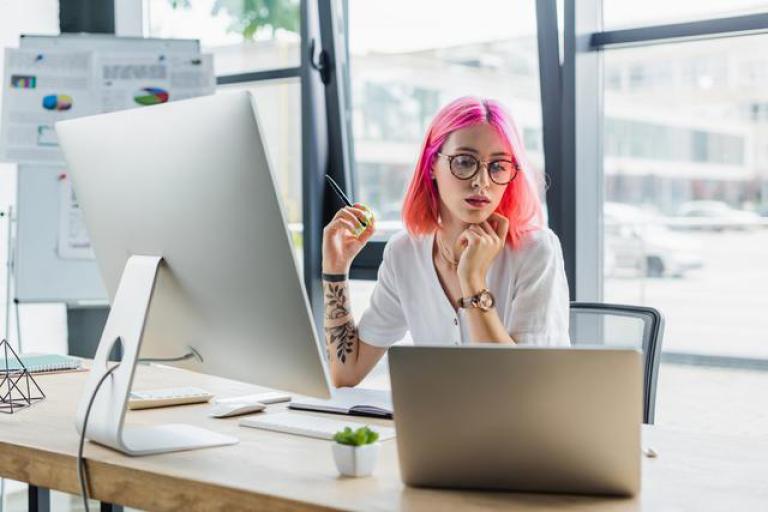 woman working with desktop